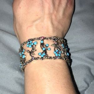 NWT, STUNNING iridescent Daisy bracelet